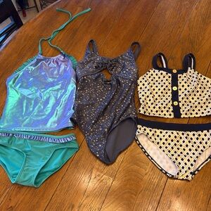 3 Girls Size 7/8 NEVER USED swimsuits.
